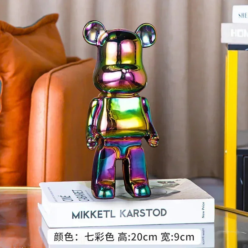 Silver chrome bear sculpture shown in a bedroom setting