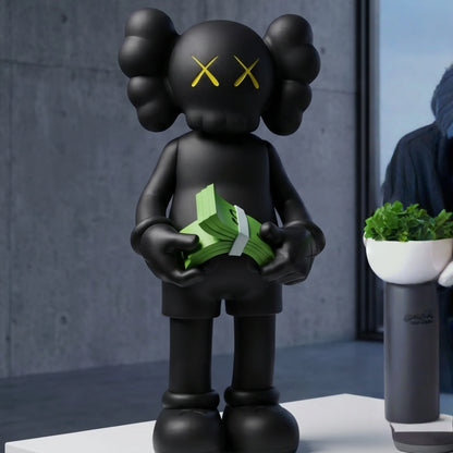 Gray bear figurine standing on a stone ledge