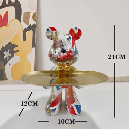 Blue graffiti-pattern bear sculpture shown against a white background with size measurement guide